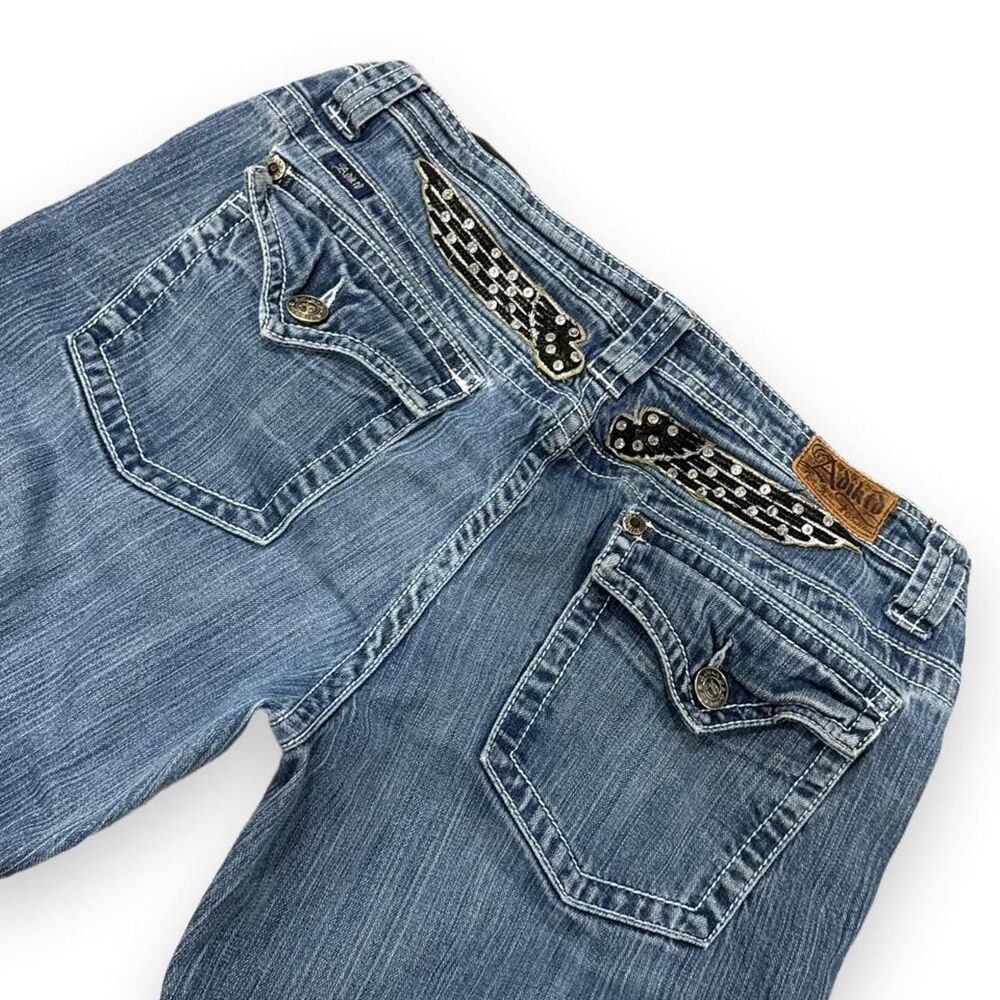Adiktd Y2K low rise flare jeans with black & white checkered rhinestone wings